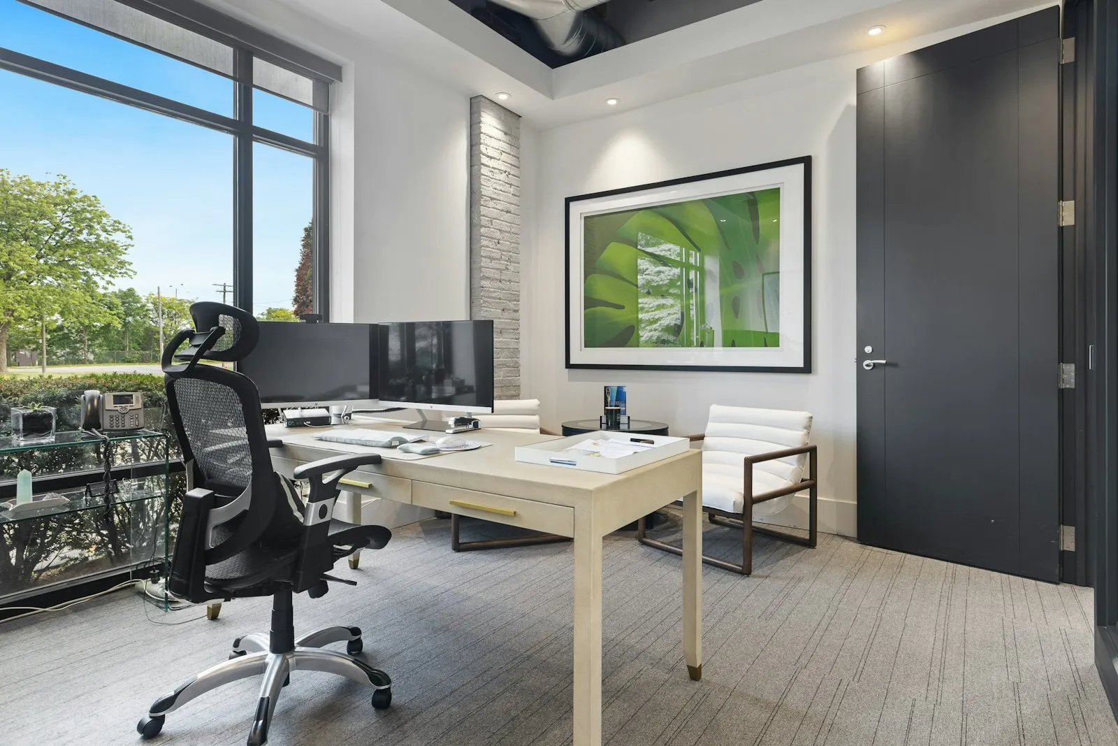 A consulting room with natural light and simple furnishing