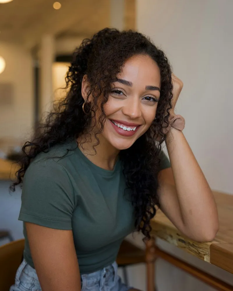 Dr Amara Okonjo photographed in natural light against a plain background