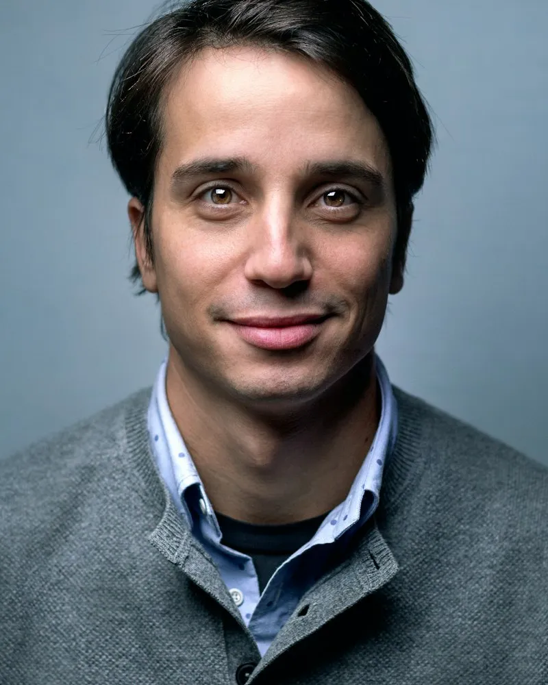 Dr James Hollis photographed in natural light against a plain background