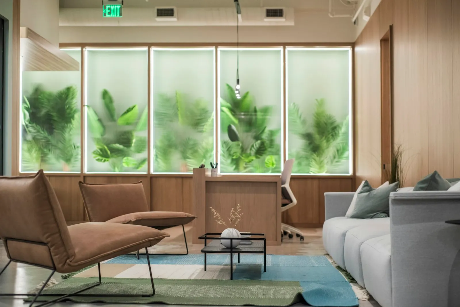 The waiting area at the Northgate Clinic, with soft seating beside a tall window